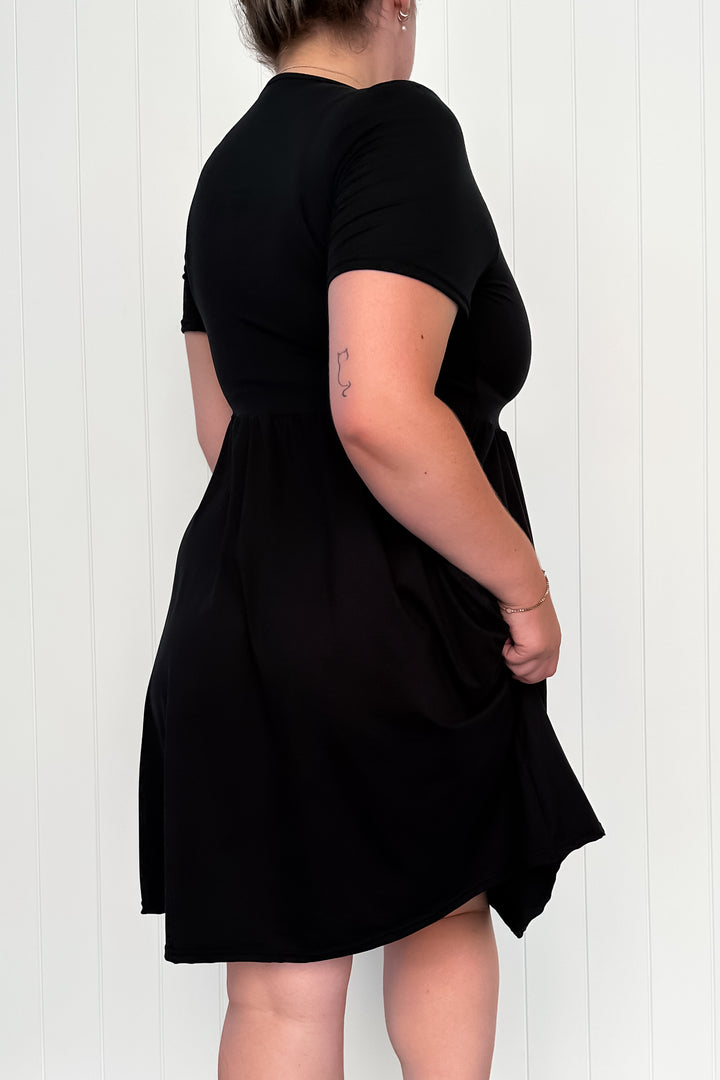 Black - Knee Length Dress - Short Sleeve - Pockets